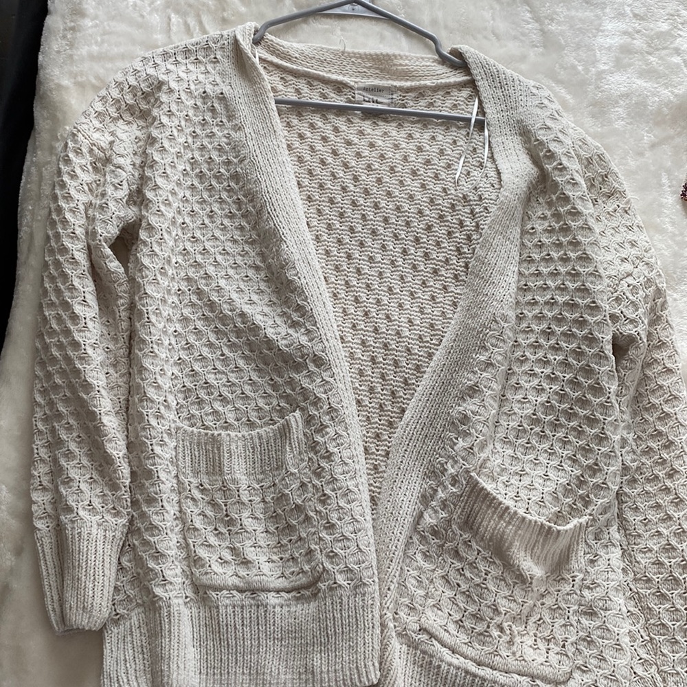 white knitted cardigan